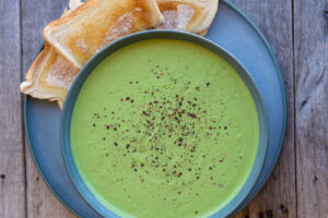 Image of protein pea soup with toast on the side.