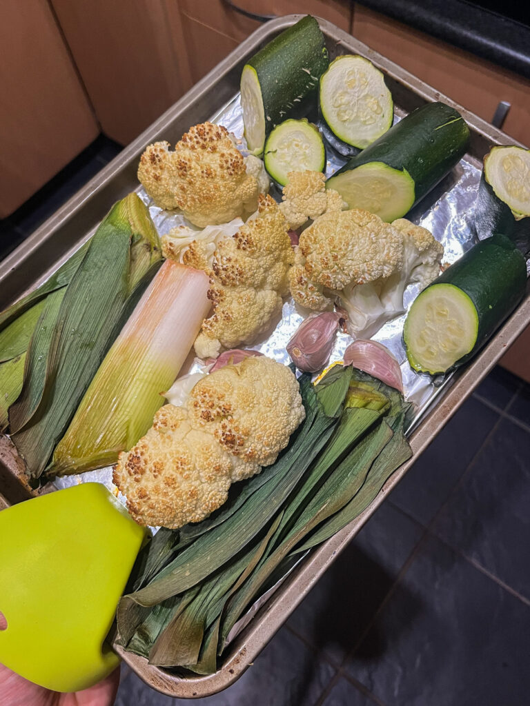 Image of soup ingredients on oven tray after being roasted