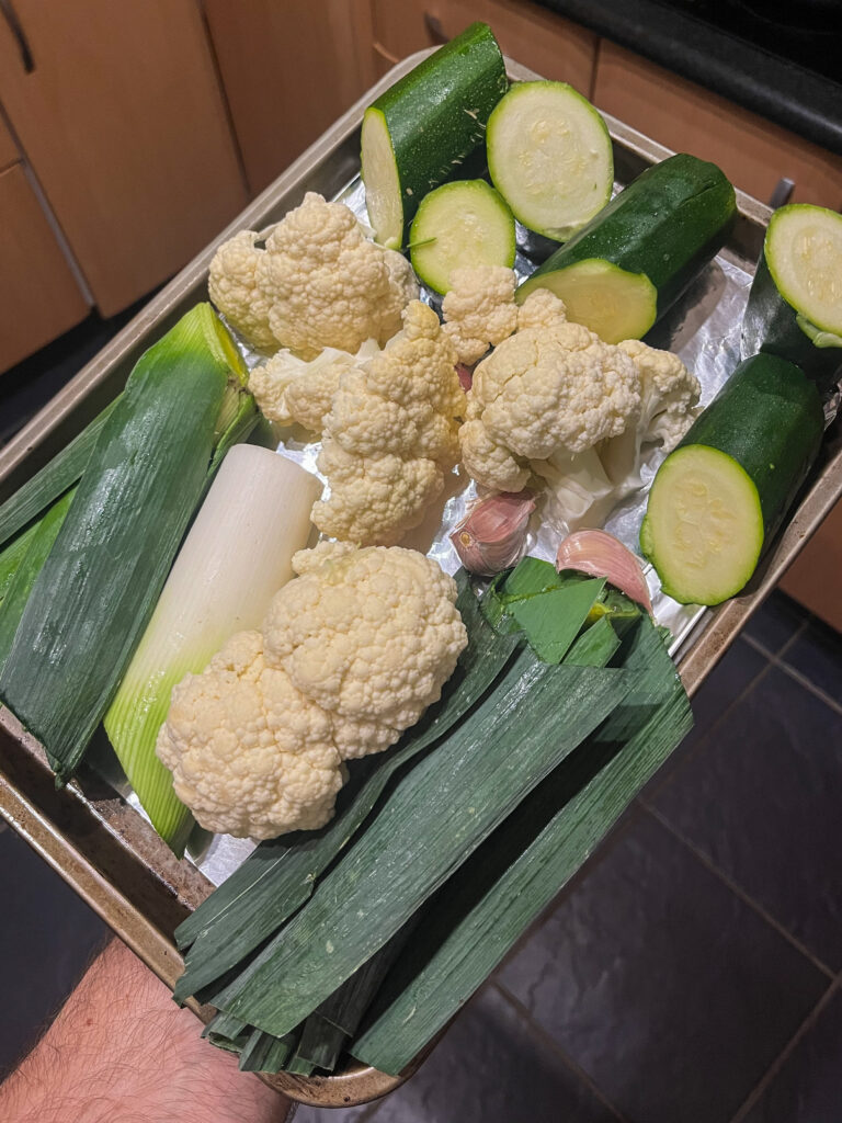 Image of soup ingredients on oven tray before being roasted