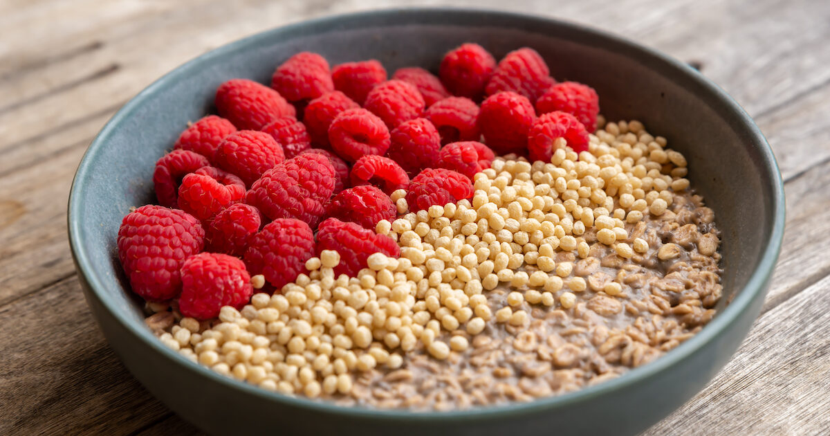 Image of overnight oats ready to eat, topped with berries and soy protein crisps.