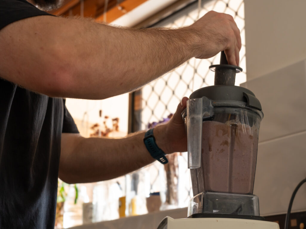 Picture of Matt blending his smoothie in a Vitamix 5200 Series blender